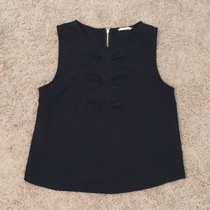 Dress up black flare top with inlaid bows